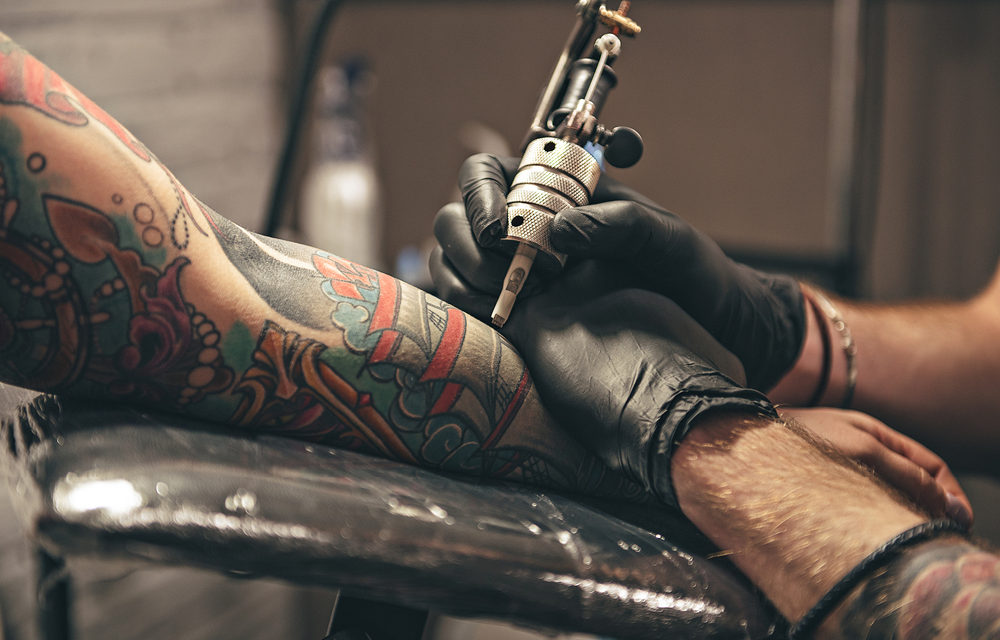 tattoo artist with needle
